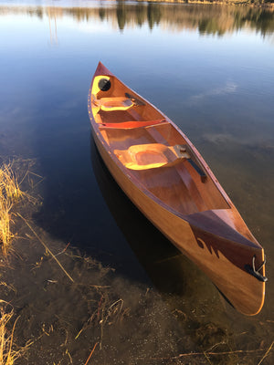 Bow view of Stitch and Glue 16' Canoe in lake
