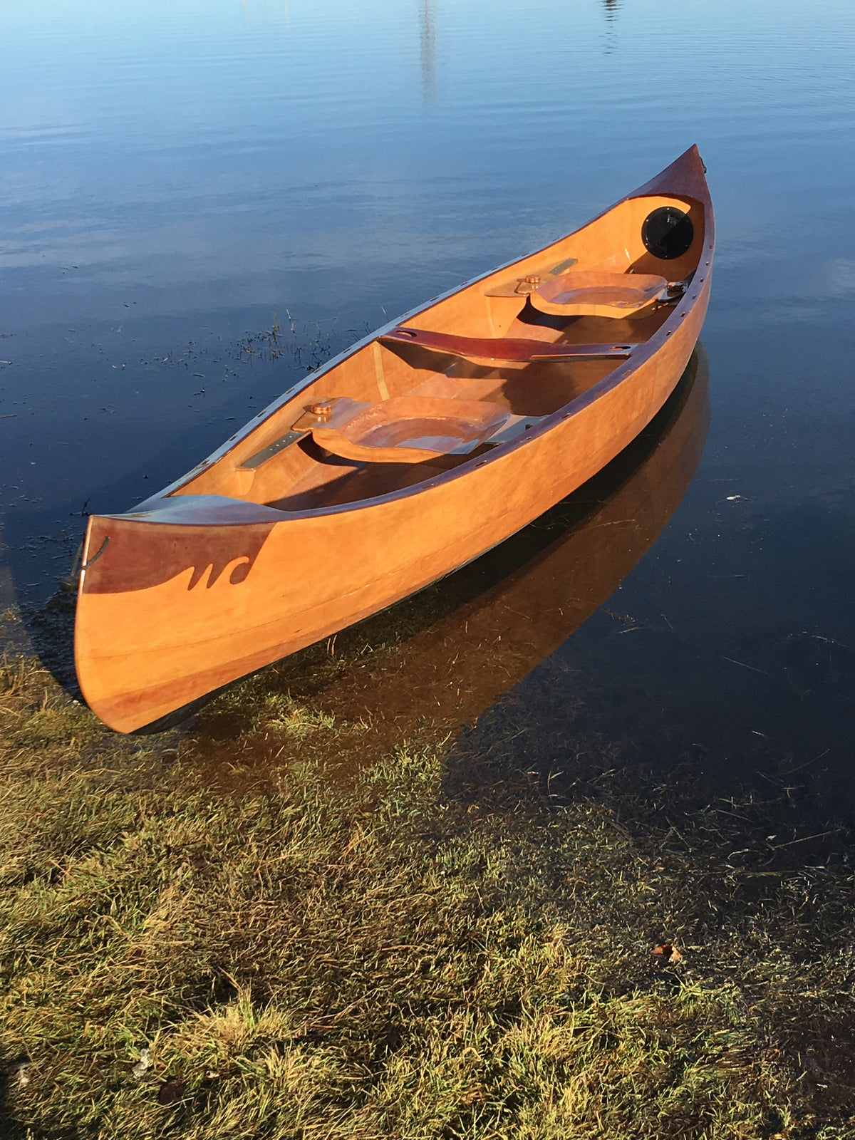 Stitch and Glue 16&#39; Canoe in lake