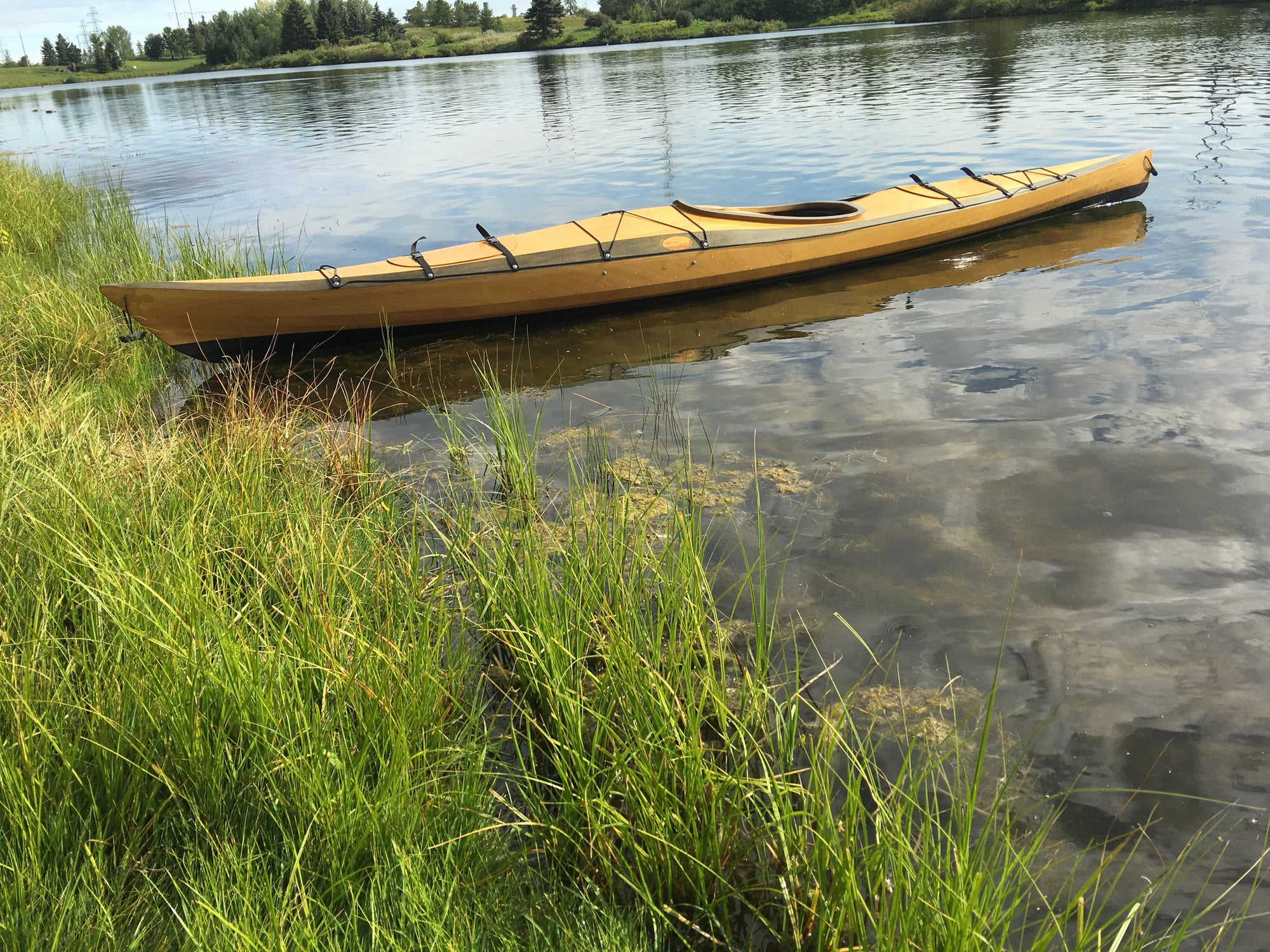 Solace 16XL Kayak in lake side profile